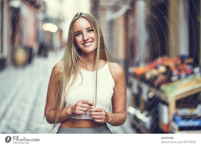Smiling young woman in urban background Lifestyle Elegant Style Happy Beautiful Hair and hairstyles Summer Human being Feminine Young woman Youth (Young adults)