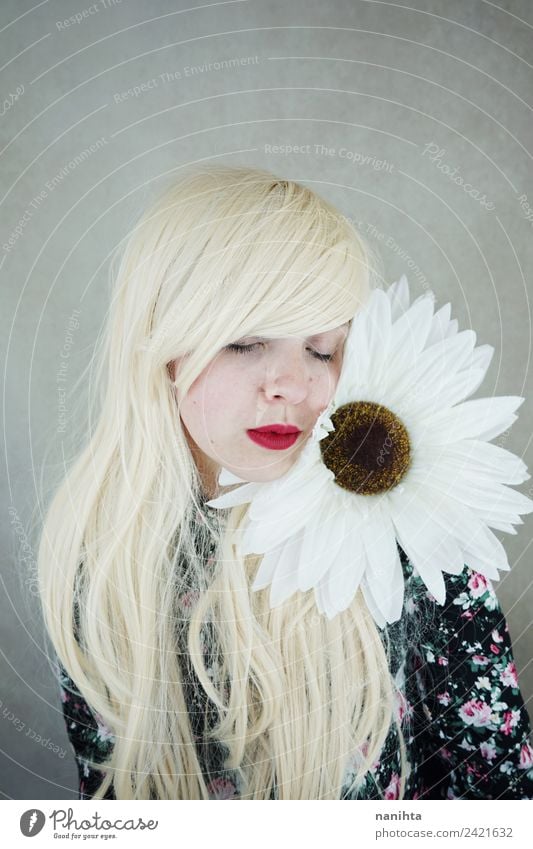 Beautiful blonde woman posing near a huge flower Lifestyle Style Design Hair and hairstyles Skin Face Senses Relaxation Fragrance Human being Feminine