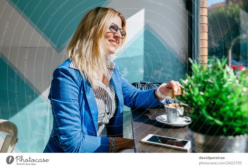 Working girl stiring coffee Coffee Lifestyle Shopping Happy Beautiful Leisure and hobbies Success Work and employment Business Telephone PDA Technology