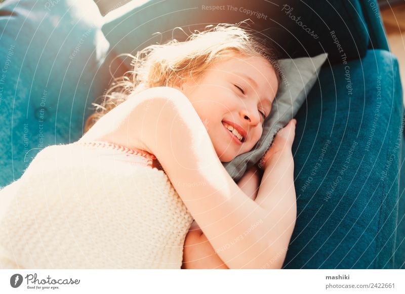kid girl relaxing at home in weekend morning Lifestyle Joy Relaxation Playing Flat (apartment) Child Infancy Fatigue Comfortable Home young laziness lazy casual