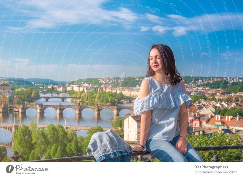 Beautiful woman and Vltava river in Prague Lifestyle Relaxation Vacation & Travel Summer Woman Adults Beautiful weather Old town Bridge Tourist Attraction