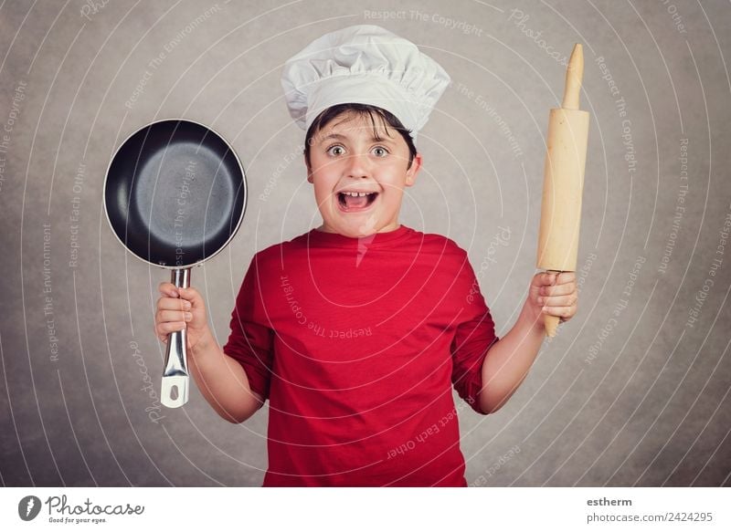 angry cook child on gray background Food Nutrition Work and employment Profession Cook Gastronomy Human being Masculine Child Toddler Boy (child) Infancy 1