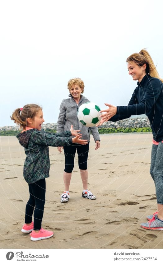 Three generations female playing on the beach Lifestyle Joy Happy Playing Beach Child Human being Woman Adults Mother Grandmother Family & Relations Sand Autumn