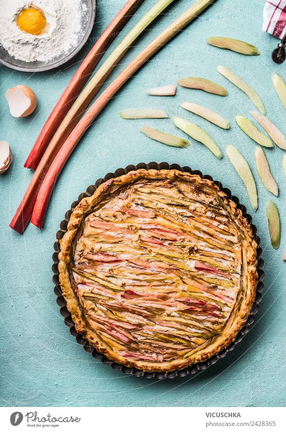 Rhubarb cake with ingredients Food Fruit Dough Baked goods Cake Nutrition Crockery Style Design Living or residing Kitchen Cooking rhubarb cake Kitchen Table