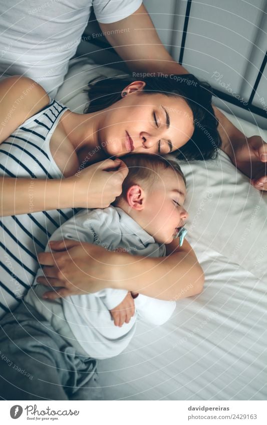 Man with his wife and son Beautiful Relaxation Calm Bedroom Child Human being Baby Toddler Woman Adults Parents Mother Father Family & Relations Couple Love