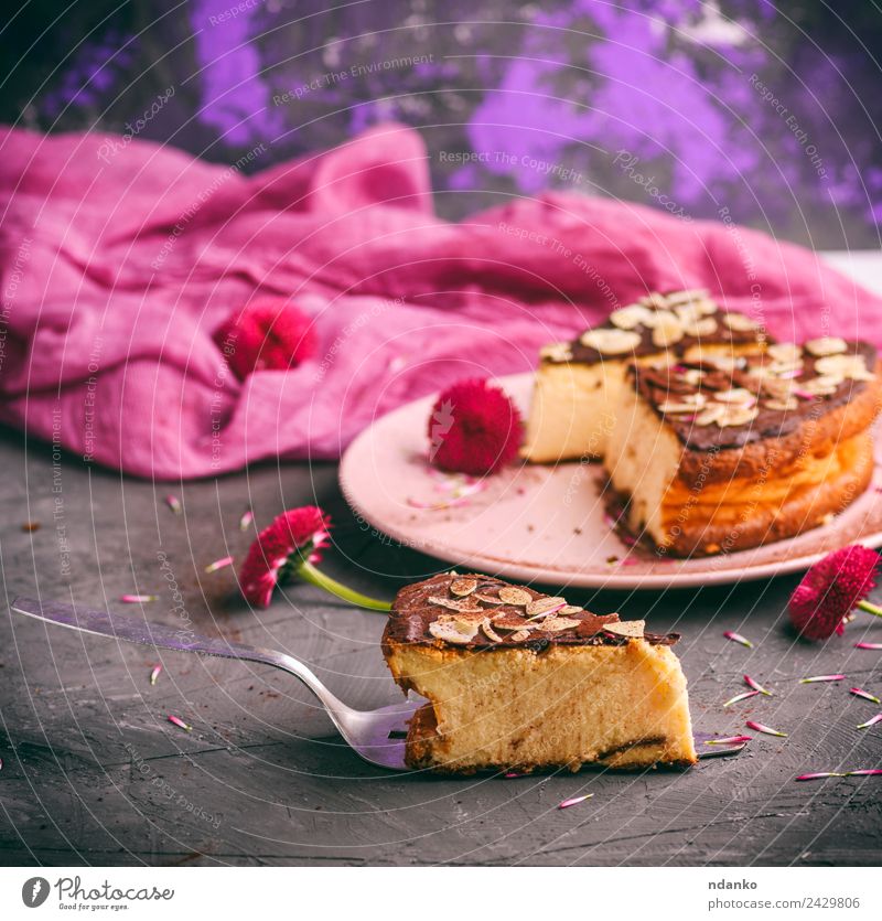 pieces of cheesecake with chocolate Cheese Dairy Products Dessert Lunch Plate Restaurant Flower Eating Fresh Delicious Pink Black Almond background Baking
