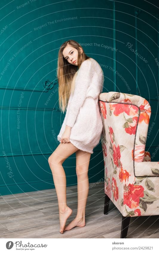 slender girl with long hair stands near a vintage chair Feminine Young woman Youth (Young adults) Adults 1 Human being 18 - 30 years