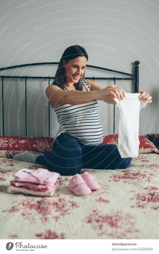 Pregnant woman looking baby girl body Lifestyle Happy Beautiful Body Hospital Human being Baby Woman Adults Mother Clothing Suitcase Footwear Kneel Smiling Love