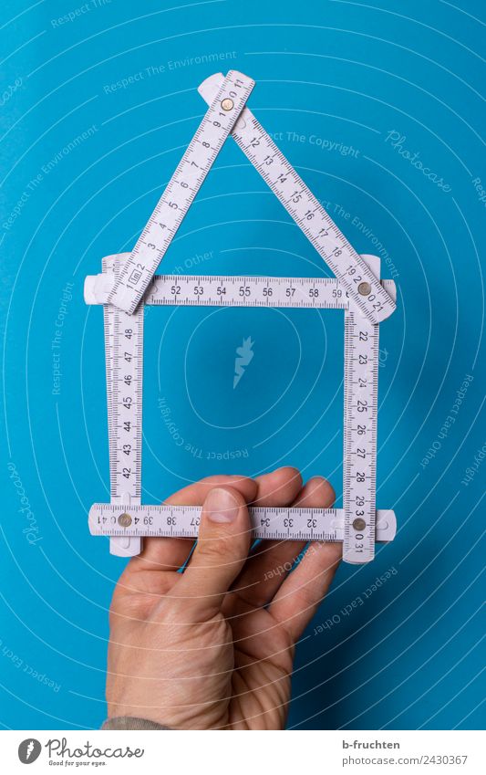House construction - folding rule - planning Craftsperson Craft (trade) Construction site Tool Tape measure Man Adults Hand Fingers Build Utilize To hold on