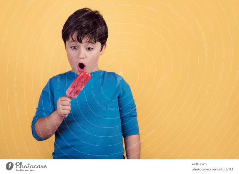 boy with a strawberry ice cream Food Ice cream Nutrition Eating Lifestyle Joy Human being Masculine Child Toddler Infancy 1 8 - 13 years Observe Movement