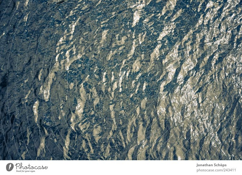 crumpled surface, cold underneath Water Waves Lake River Blue Wet Cold Damp Reflection Surface Surface structure Exterior shot Bird's-eye view Flat Simple