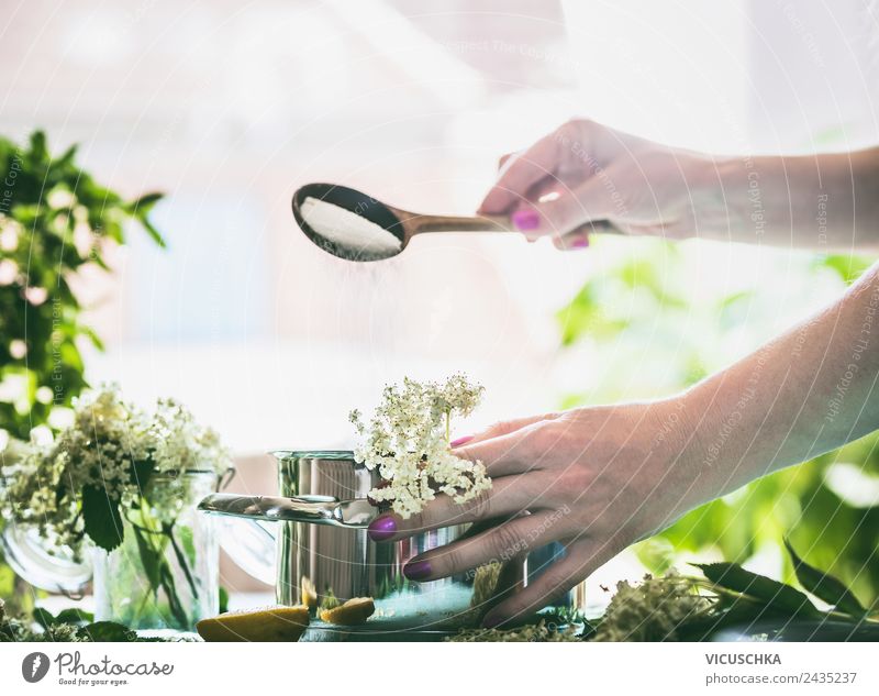 Cook elderflower syrup or jam Food Nutrition Pot Spoon Lifestyle Style Design Healthy Alternative medicine Healthy Eating Summer Living or residing Feminine