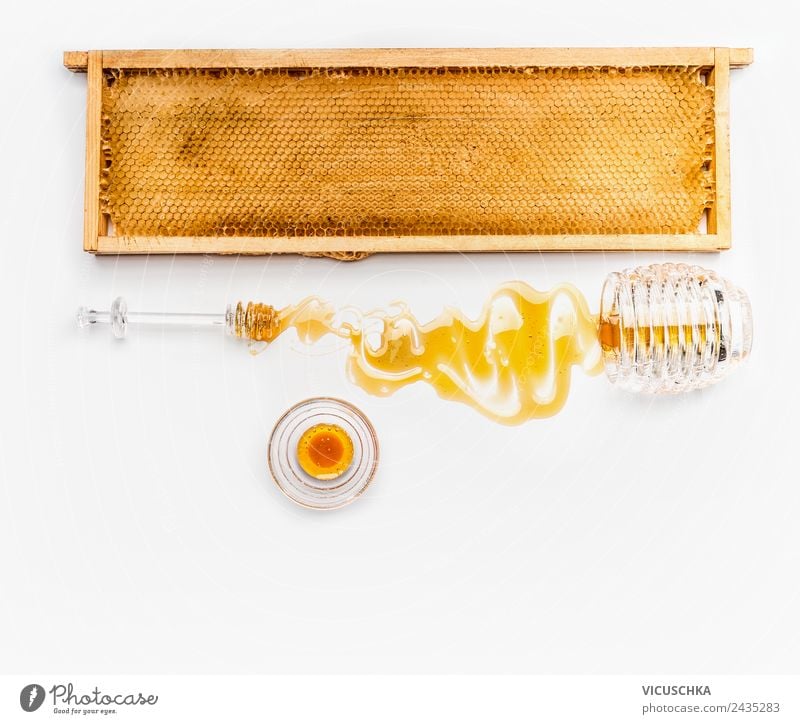 Honeycomb in a wooden frame with honey in a jar Food Nutrition Organic produce Vegetarian diet Diet Style Design Healthy Healthy Eating Honey-comb Cast Glass