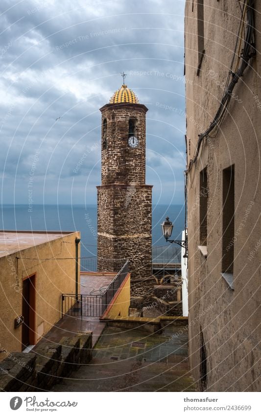 SARDINIA, CITY BY THE SEA WITH CHURCH TOWER Far-off places City trip Ocean Island Living or residing Sky Clouds Horizon Weather Bad weather Mediterranean sea