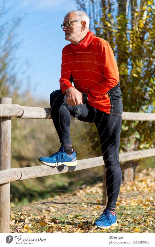 Full length Runner in red sportswear standing Lifestyle Joy Sports Sportsperson Jogging Retirement Human being Masculine Man Adults Male senior 1