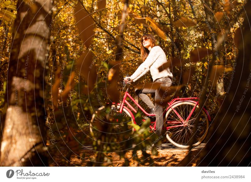 Woman with a bike in the middle of the forest. Lifestyle Happy Vacation & Travel Trip Garden Sports Human being Adults 1 18 - 30 years Youth (Young adults)