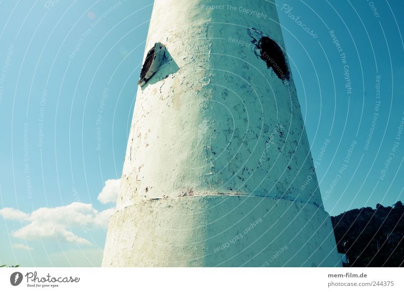 round and thick Lighthouse Tower Concrete Round Building Blue White windowless Ocean