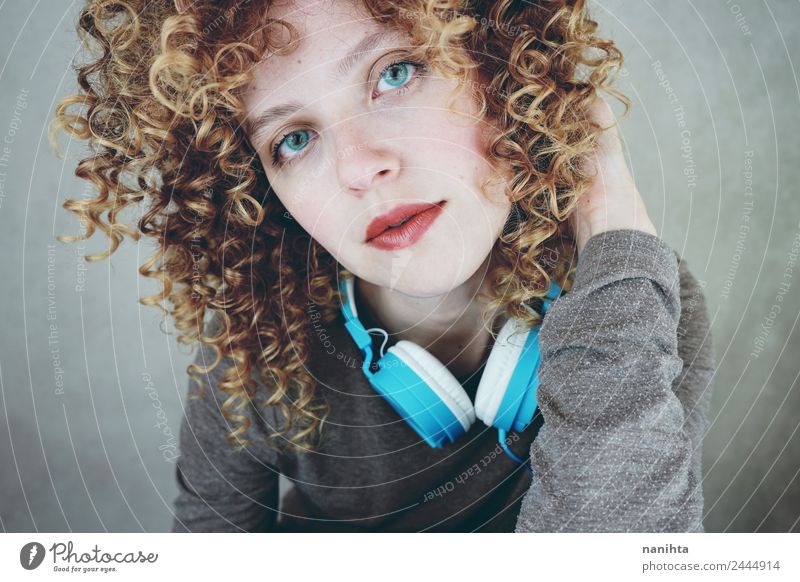 Young blonde woman with blue eyes with a headset Lifestyle Style Beautiful Hair and hairstyles Skin Face Leisure and hobbies Headset Technology