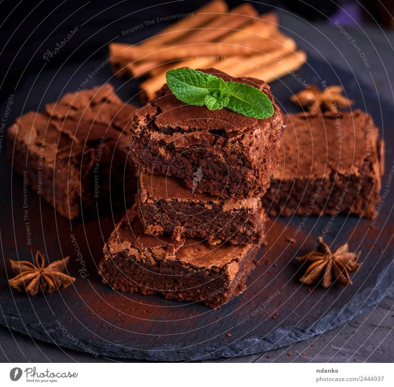 baked chocolate cake Cake Dessert Candy Nutrition Eating Dark Fresh Delicious Above Soft Brown Black brownies Stack background Home-made sweet Tasty Baking