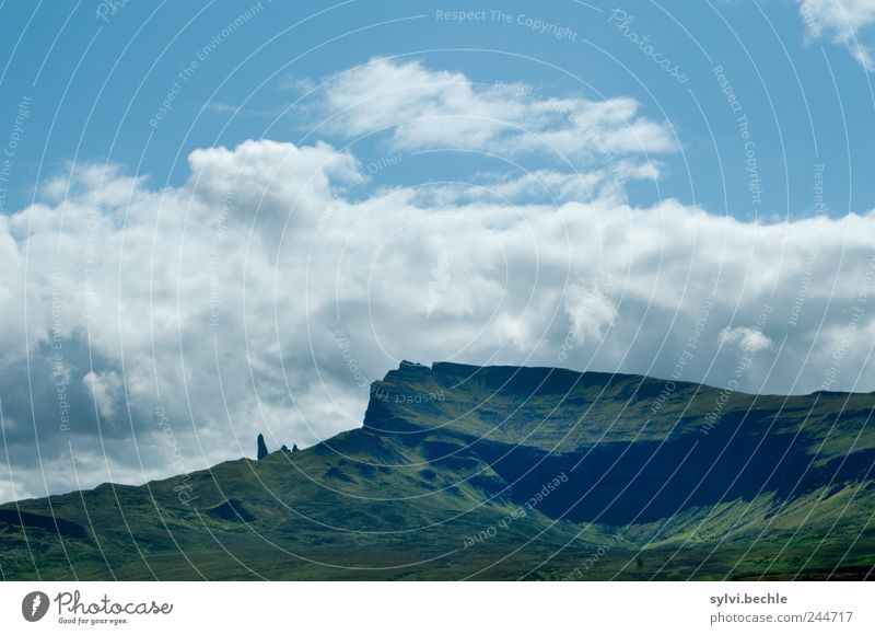 Scotland II Nature Landscape Sky Clouds Summer Climate Hill Rock Mountain Blue Green Environment Towering Volcanic crater Bank of clouds Europe Old Man of Storr