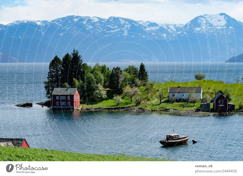 Houses by the lake Environment Nature Landscape Plant Snow Mountain Fjord Idyll Island Uniqueness Norway Beautiful Loneliness Remote Withdraw Watercraft