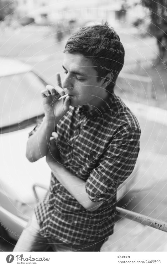 young guy in a shirt smokes on the street Elegant Style Leisure and hobbies Masculine Young man Youth (Young adults) Adults Hair and hairstyles 1 Human being