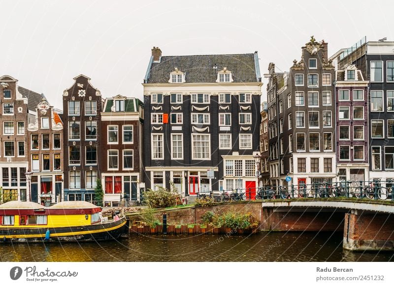 Architecture Of Dutch Houses Facade and Houseboats On Amsterdam Canal canal Netherlands City House (Residential Structure) Famous building Vacation & Travel