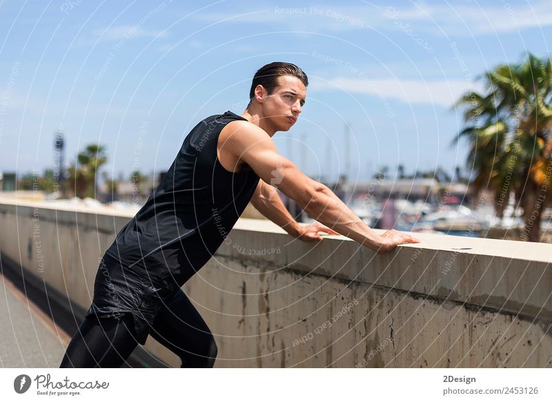 Strong Man Stretching Calf and Leaning on Wall Lifestyle Body Health care Wellness Summer Sports Human being Masculine Young man Youth (Young adults) Adults 1