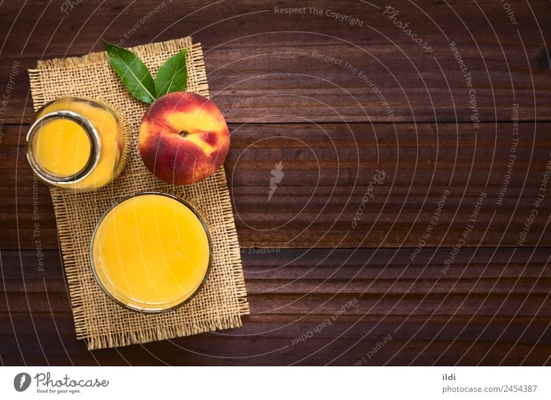 Peach Juice or Nectar Fruit Beverage Fresh food drink drupe Refreshment sweet glass healthy overhead copy space Horizontal refreshing ripe ingredient