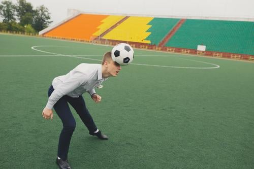 office worker plays football at the stadium Sports Fitness Sports Training Sportsperson Sports team Goalkeeper Soccer Foot ball Sporting Complex Football pitch