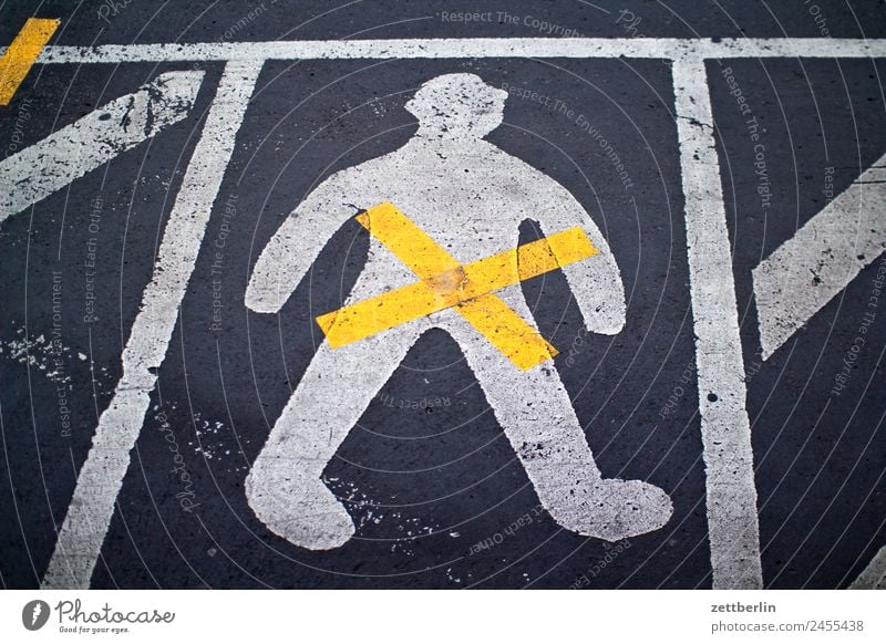 gender Asphalt Lane markings Signage Warning label Clue Crucifix Line Man Signs and labeling Human being Deserted Navigation Orientation Pictogram Street