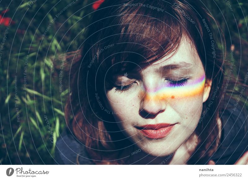 Young woman with a rainbow in her face Lifestyle Style Design Beautiful Wellness Harmonious Well-being Senses Relaxation Meditation Human being Feminine