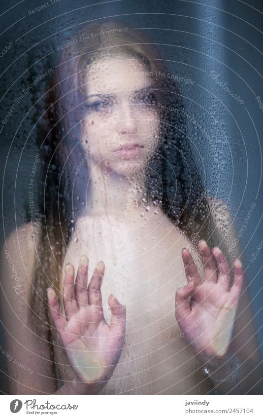Sad woman looking through the window on a rainy day Beautiful Body Face Human being Feminine Young woman Youth (Young adults) Woman Adults 1 18 - 30 years Drop