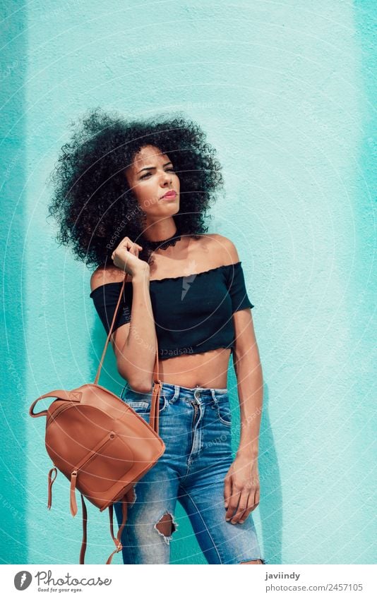 Young mixed woman with afro hair standing on the street Lifestyle Style Happy Beautiful Hair and hairstyles Face Human being Feminine Young woman