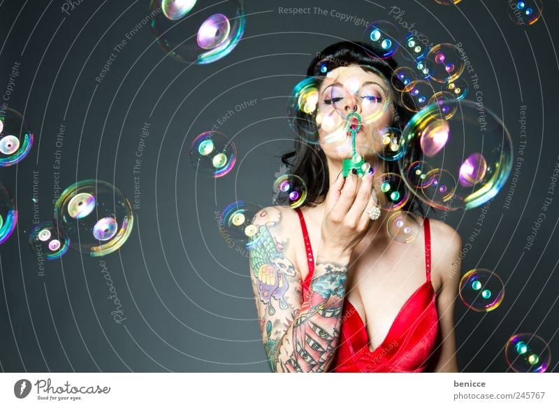 bubbles Woman Human being Soap bubble Blow Tattoo Tattooed Piercing Playing Isolated (Position) Circle Ring Joy Funny Contrast Diva