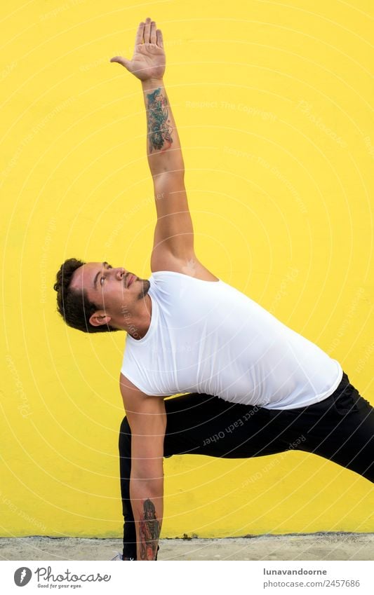 Mexican yoga teacher practicing side angle pose Lifestyle Joy Sports Fitness Sports Training Yoga Masculine Man Adults 1 Human being 18 - 30 years