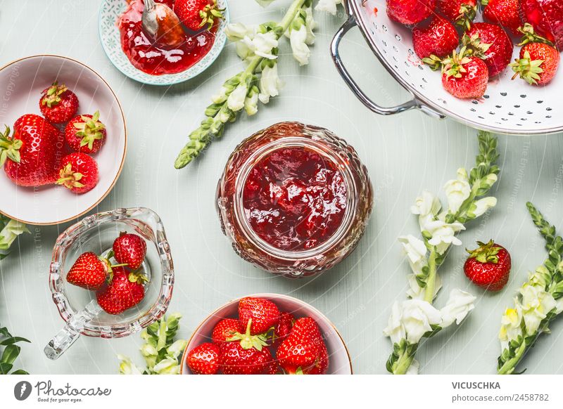 Strawberry jam in glass with berries and flowers Food Fruit Jam Nutrition Breakfast Organic produce Vegetarian diet Diet Crockery Style Design Healthy