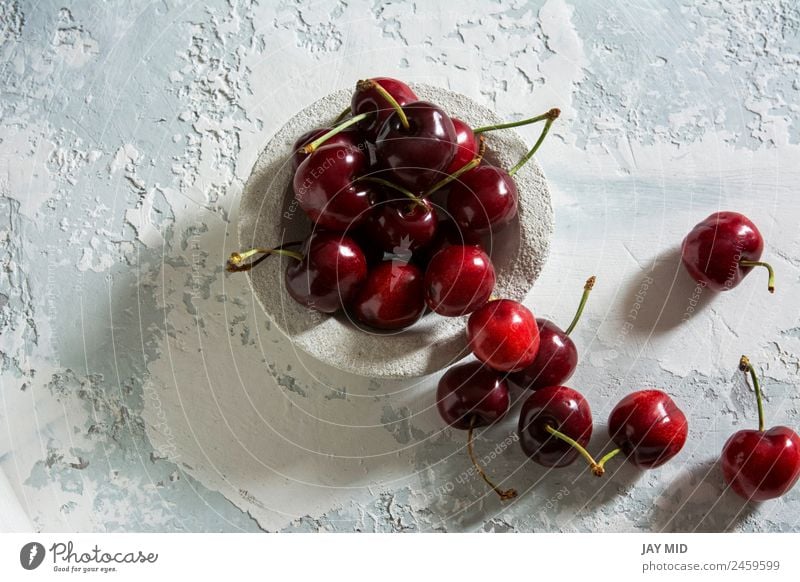 delicious cherries Food Fruit Dessert Candy Nutrition Breakfast Vegetarian diet Plate Bowl Style Table Nature Leaf Fresh Glittering Bright Delicious Above Juicy