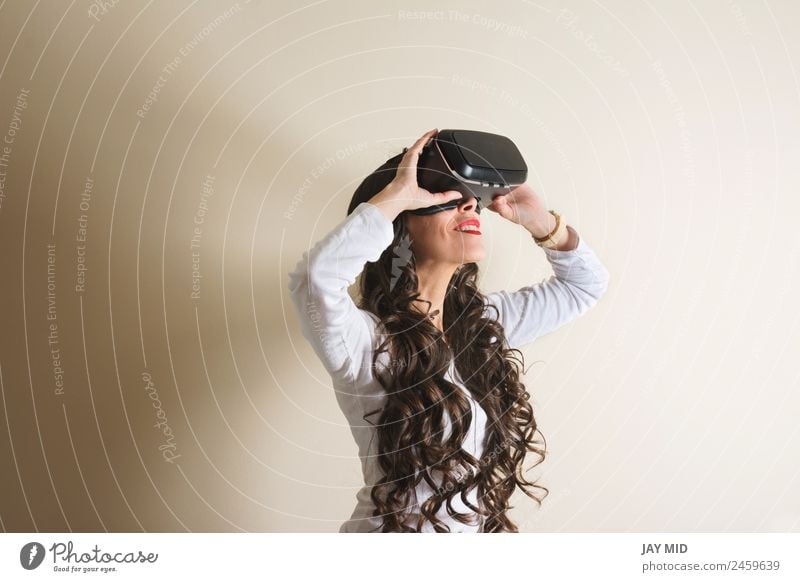 woman with glasses of virtual reality vr Virtual Really Woman Headset Cellphone Entertainment Smiling Telephone Video Modern Technology gamer Intellect