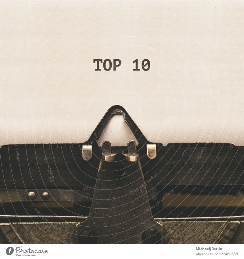 Top 10 typed in typewriter Characters Old Nostalgia Countdown Analog Vintage Classification cover Song Typewriter Text Hit hit list Colour photo Close-up