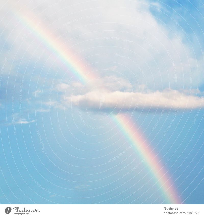 Rainbow on cloud and blue sky - a Royalty Free Stock Photo from