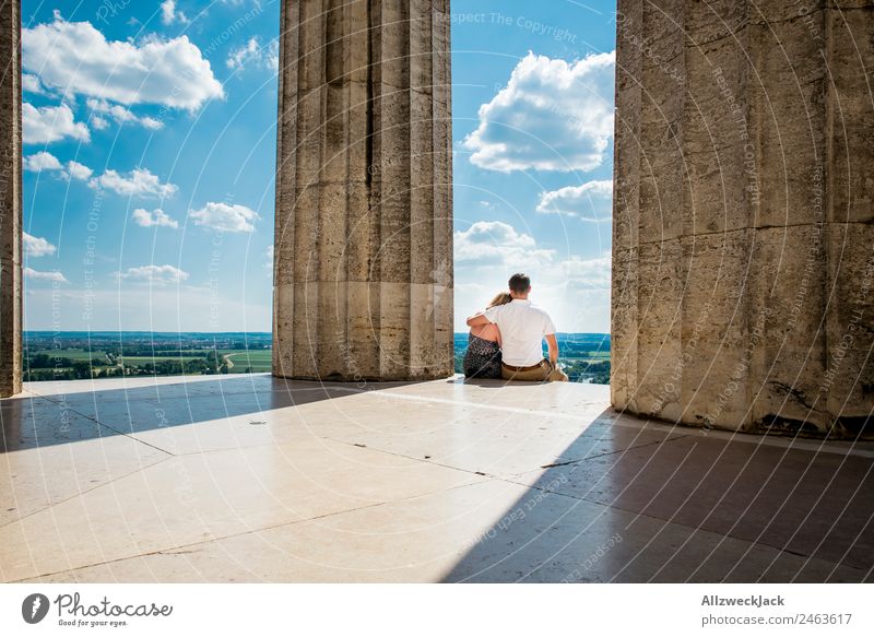 Couple sits arm in arm and enjoys the view Germany Regensburg Walhalla Tourist Attraction Column Vantage point Far-off places Panorama (View) Danube