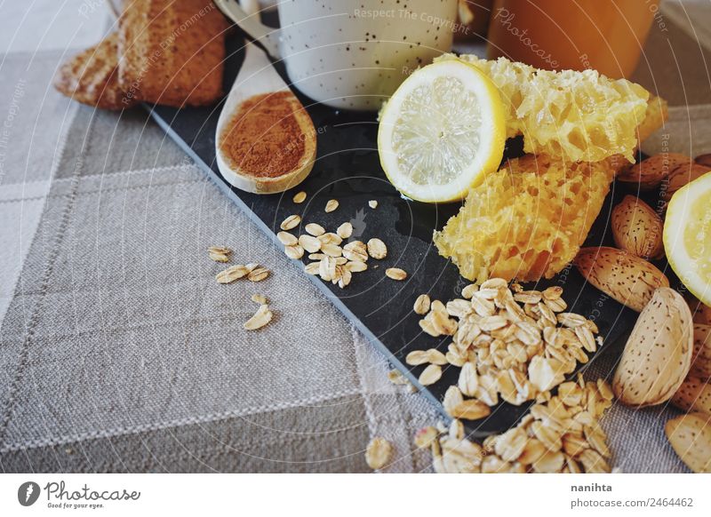 Healthy breakfast against common cold Food Fruit Grain Dough Baked goods Herbs and spices Cinnamon Lemon Almond Oats Oat flakes Honey Honeycomb Nutrition