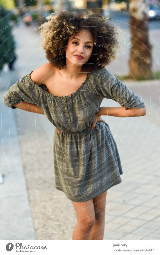 Young mixed woman with afro hairstyle smiling outdoors Lifestyle Style Happy Beautiful Hair and hairstyles Face Human being Feminine Young woman