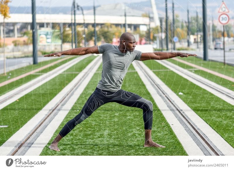 Black man practicing yoga in urban background. Lifestyle Sports Yoga Human being Masculine Young man Youth (Young adults) Man Adults 1 18 - 30 years Fitness