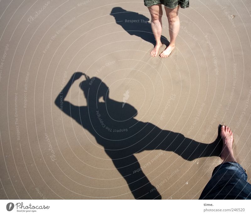 holiday photo Beach Human being Legs Feet 2 Sand Pants Dress Stand Take a photo Posture Colour photo Exterior shot Shadow Silhouette Deep depth of field