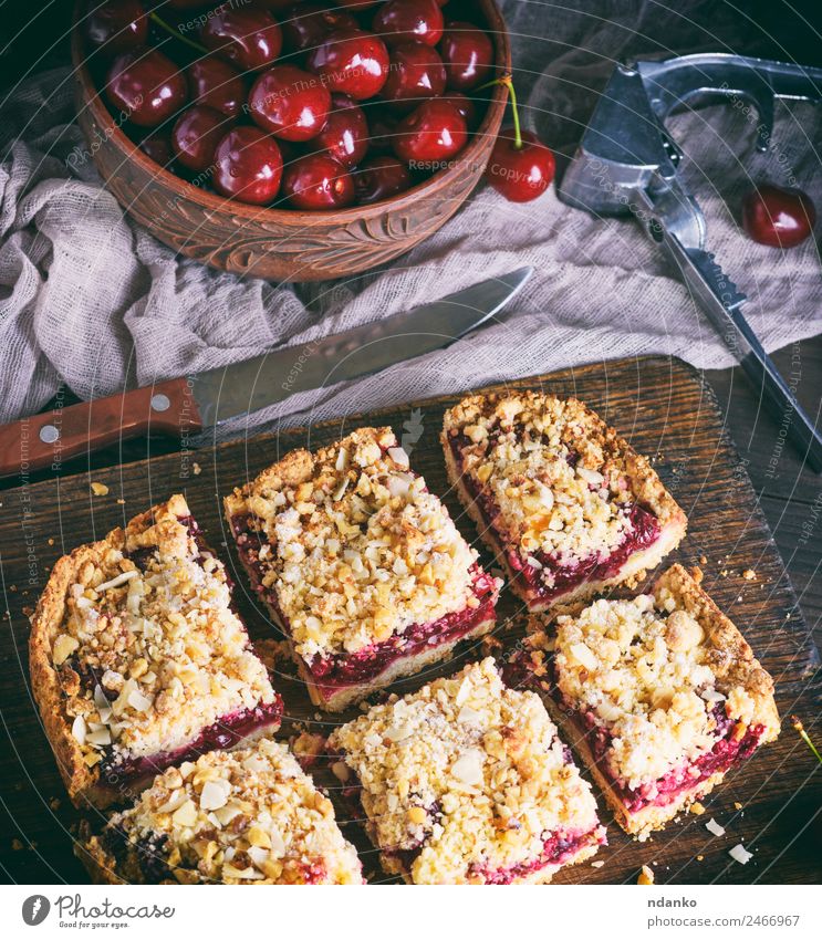 square pieces of cake crumble with cherry Fruit Dessert Candy Vegetarian diet Table Wood Fresh Delicious Above Brown Yellow Red Cherry Pie Baked goods tart food