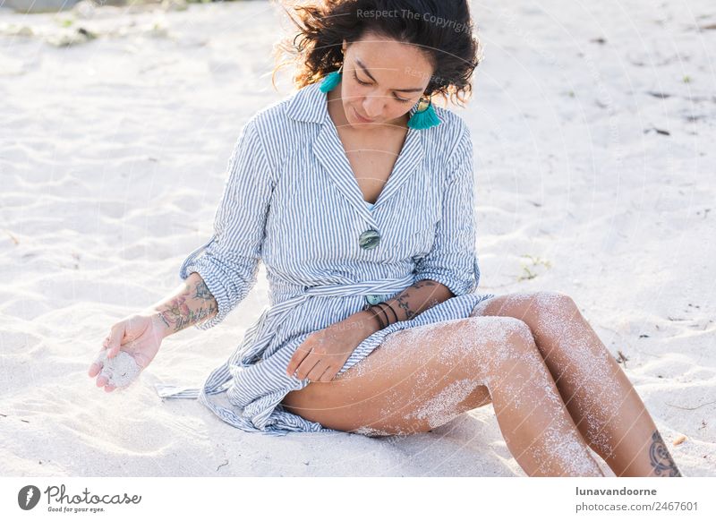 Thoughtful latin woman on the beach Lifestyle Style Joy Happy Calm Vacation & Travel Summer Beach Ocean Human being Woman Adults Dress Brunette Stripe Emotions