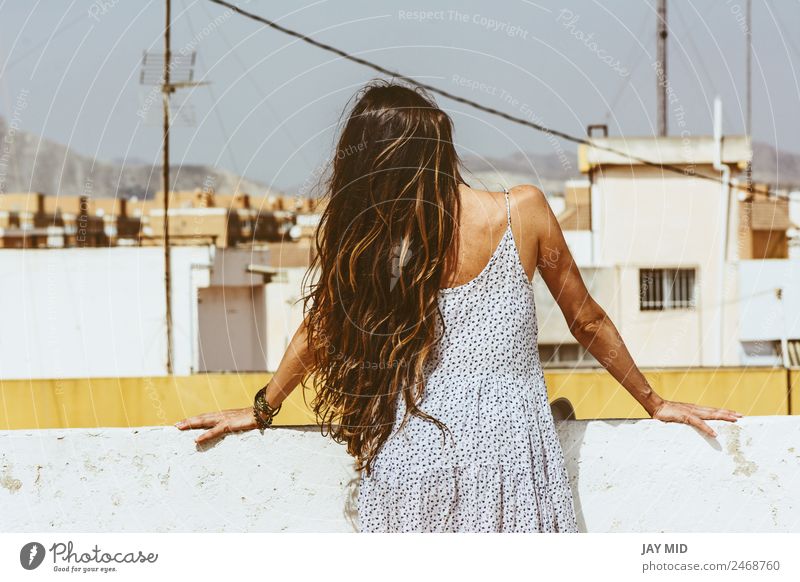 woman looking at the city on the skyline, from behind Lifestyle Happy Beautiful Vacation & Travel Tourism Summer Human being Feminine Woman Adults 1 Landscape