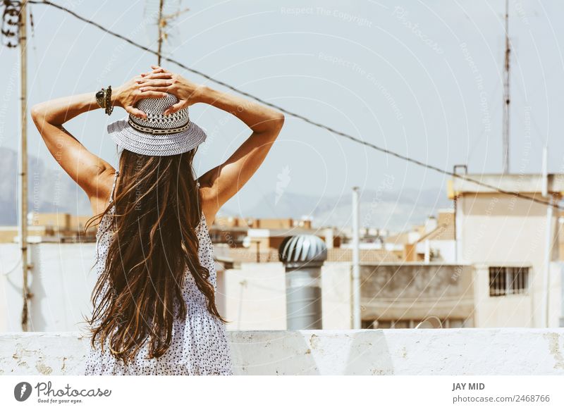 Woman with hat and hands on her head, views of the city Lifestyle Happy Beautiful Vacation & Travel Tourism Summer Human being Feminine Adults